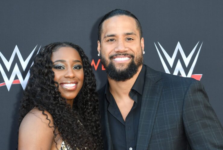 Naomi, WWE star, is expecting a child while giving up her world title.